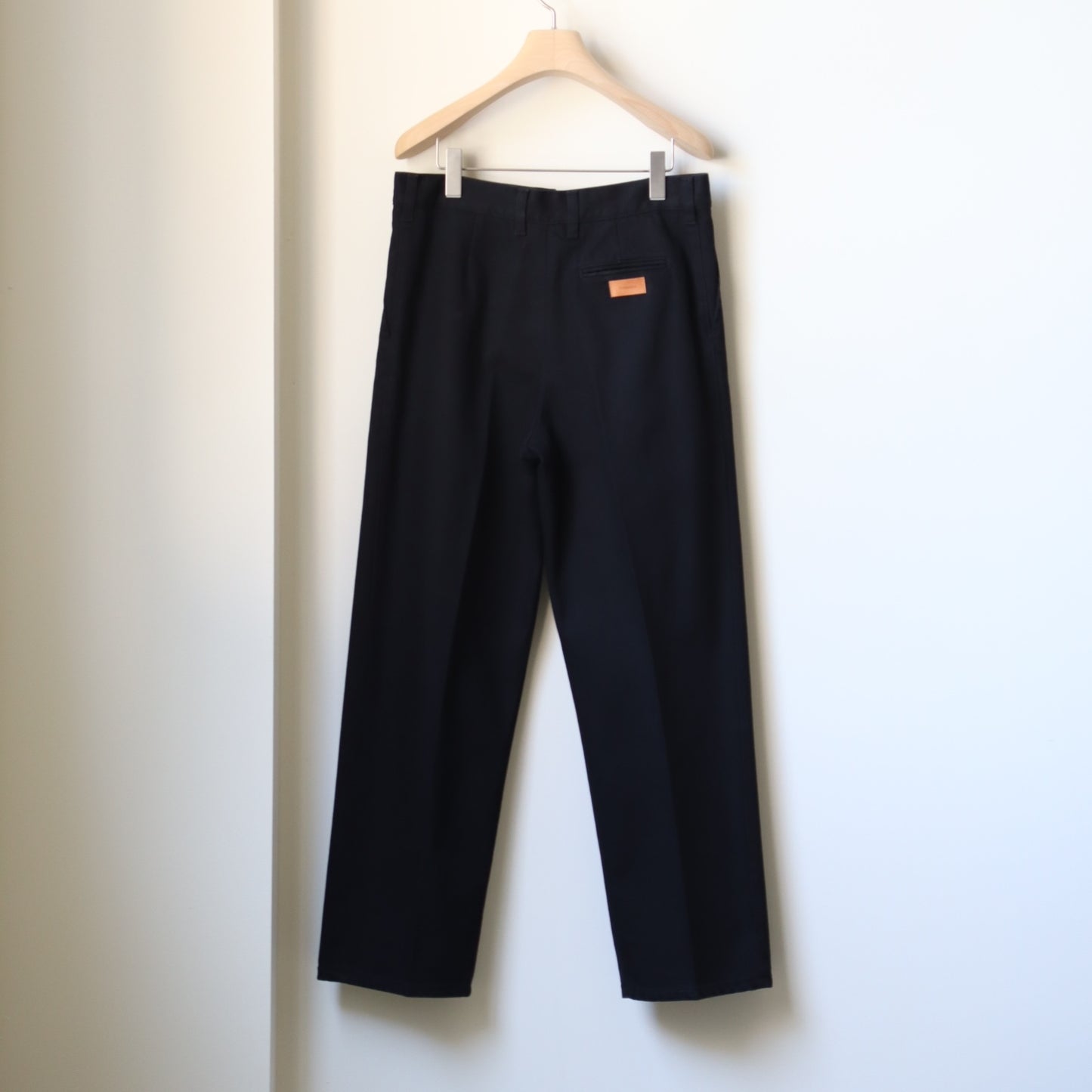 BLACK DENIM PLEATED TROUSERS