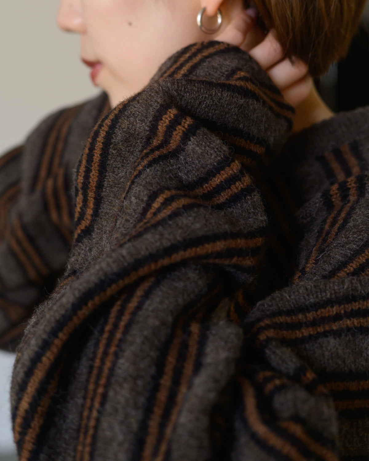 DIGONAL STRIPED SWEATER