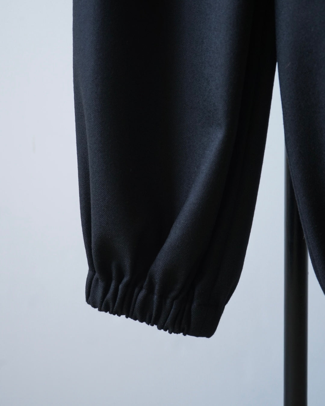 WIDE TUCK TROUSERS