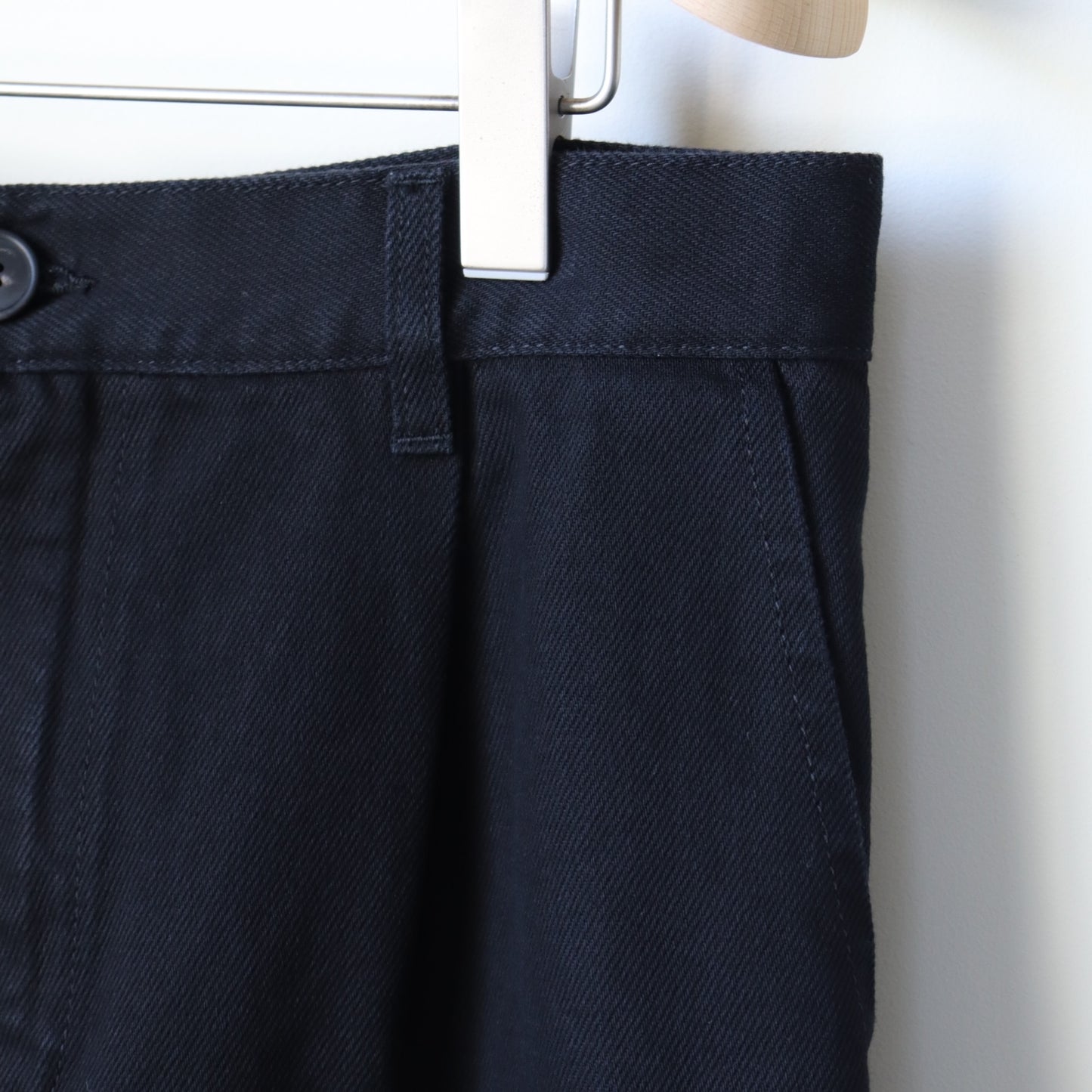 BLACK DENIM PLEATED TROUSERS