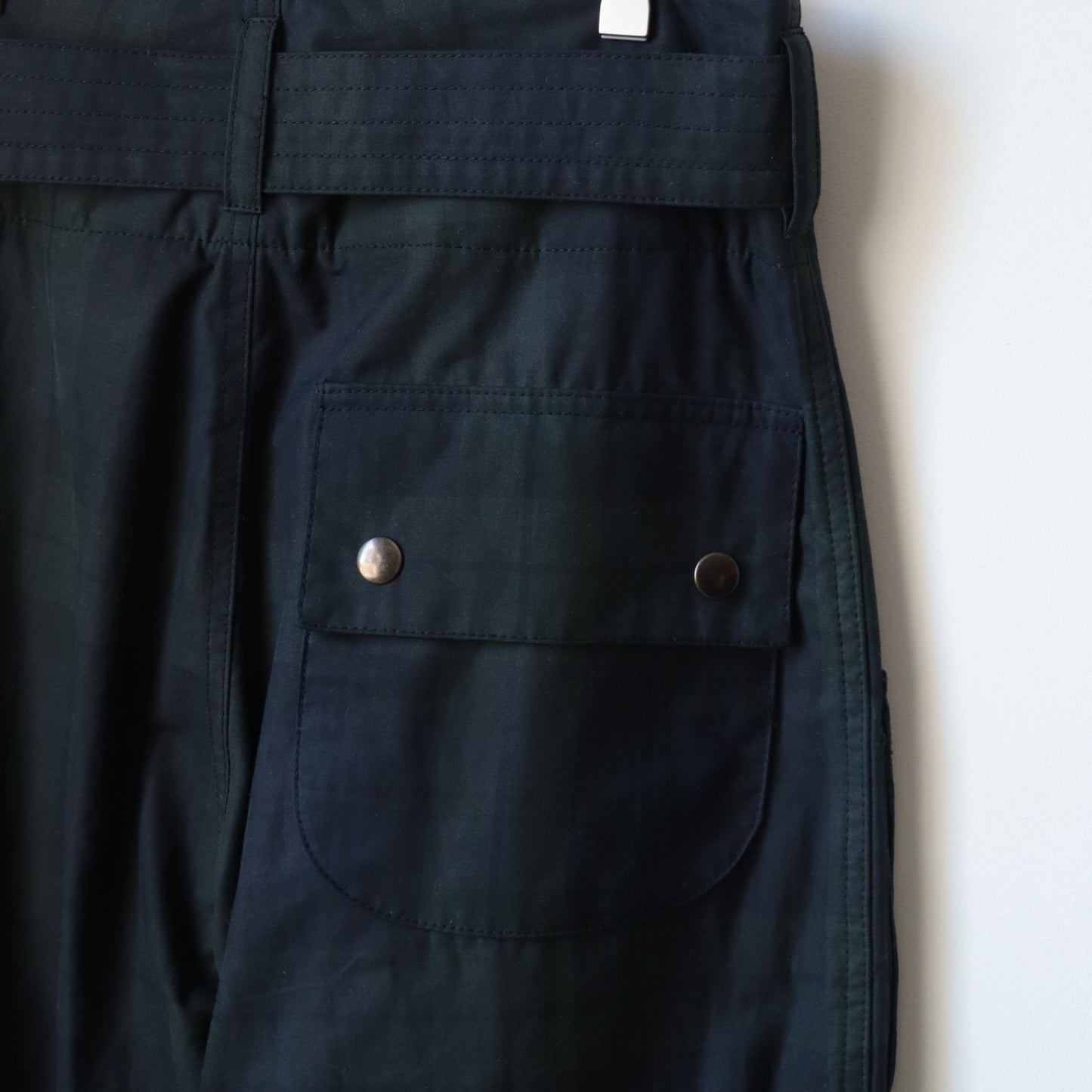 OILED TARTAN PLAID BELT PANTS