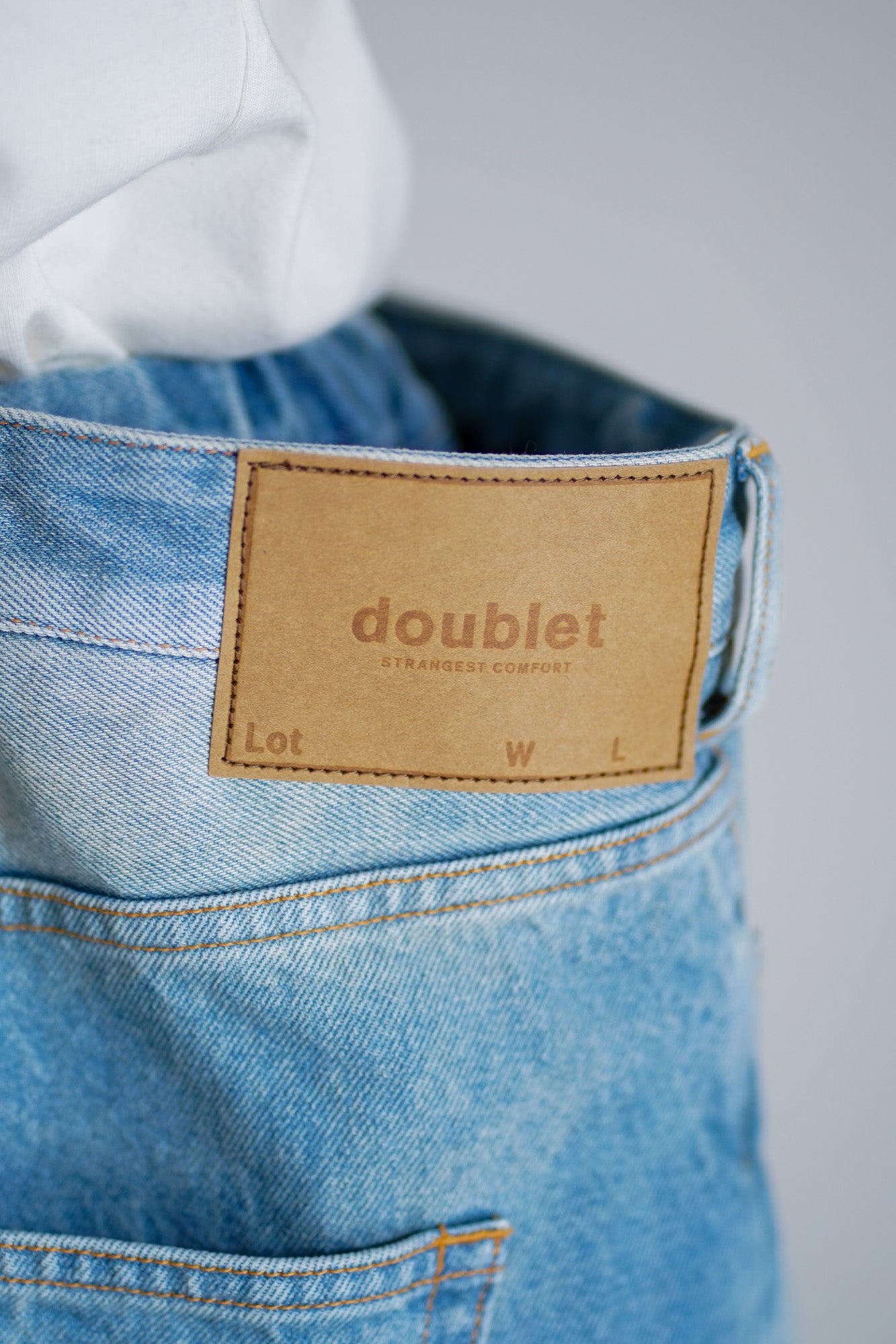 FLOATING WAIST DENIM PANTS