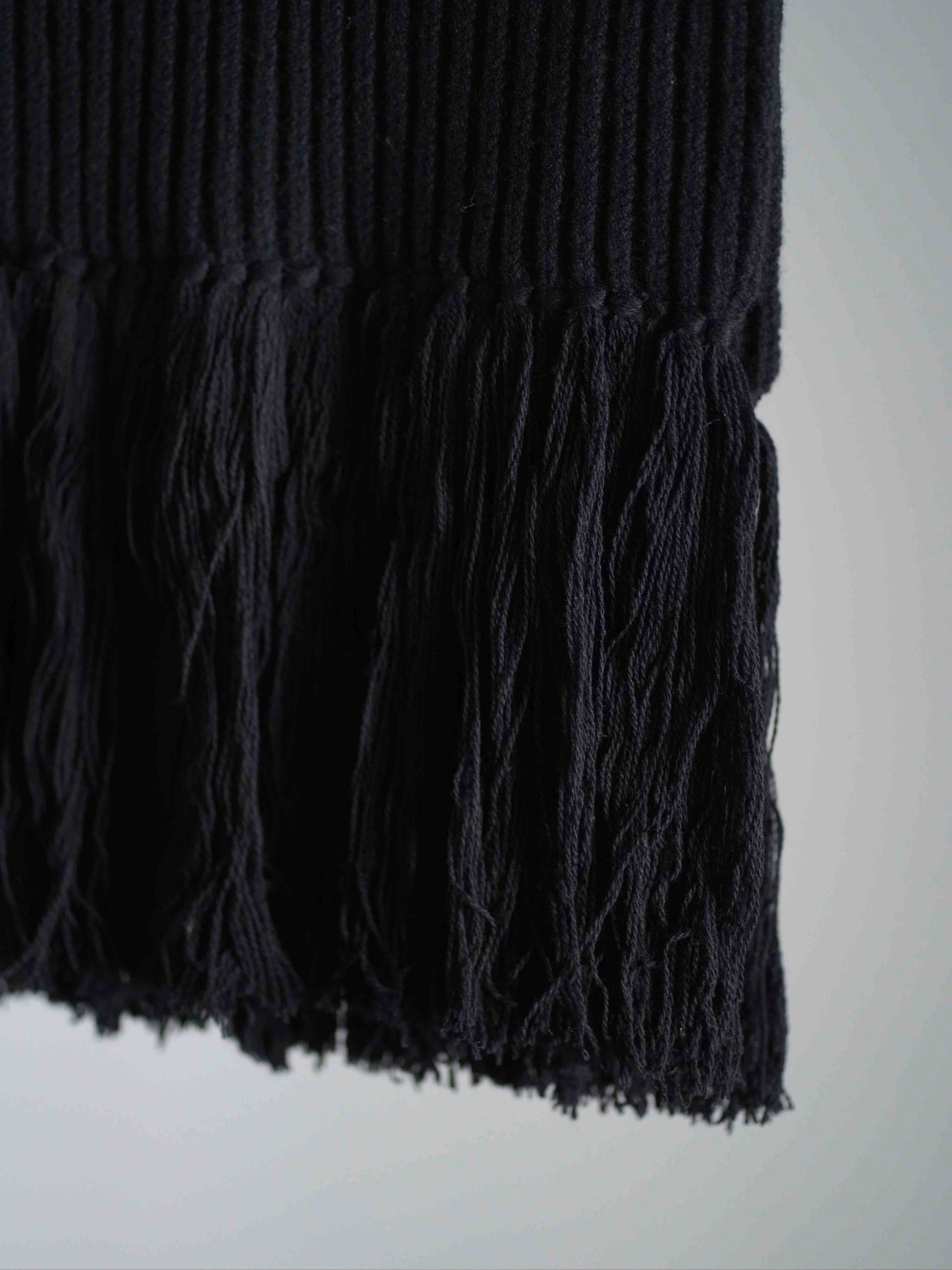 WOOL RIBBED SWEATER TOP WITH FRINGE