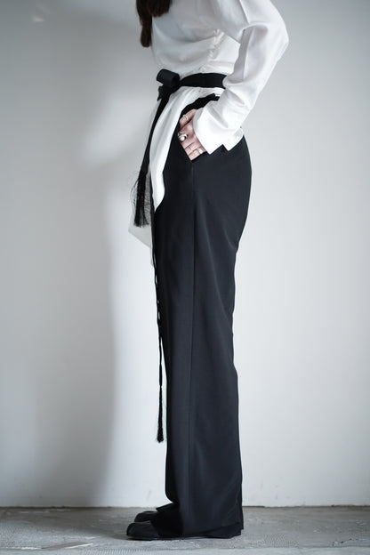 FRINGED BELT TROUSERS