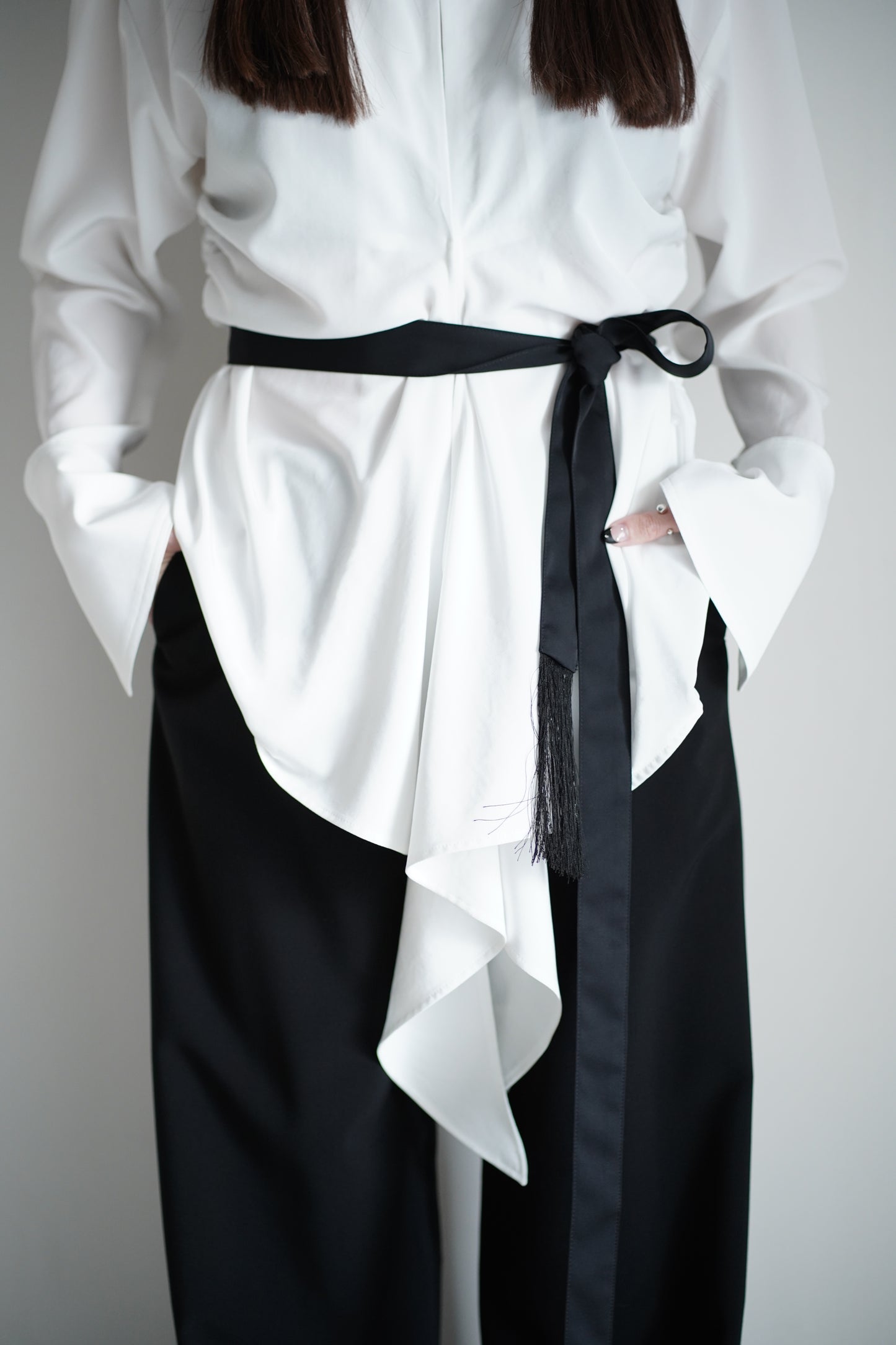 FRINGED BELT TROUSERS