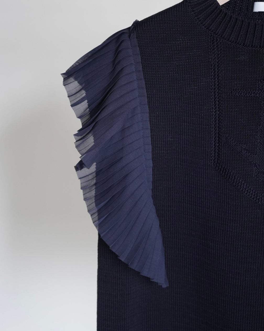 SLEEVELESS PLEATED GUERNSEY KNIT