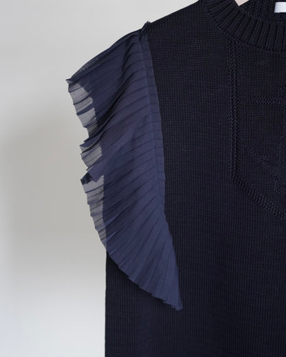 SLEEVELESS PLEATED GUERNSEY KNIT