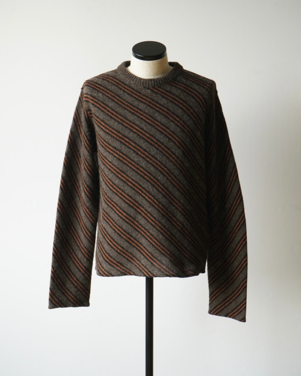 DIGONAL STRIPED SWEATER