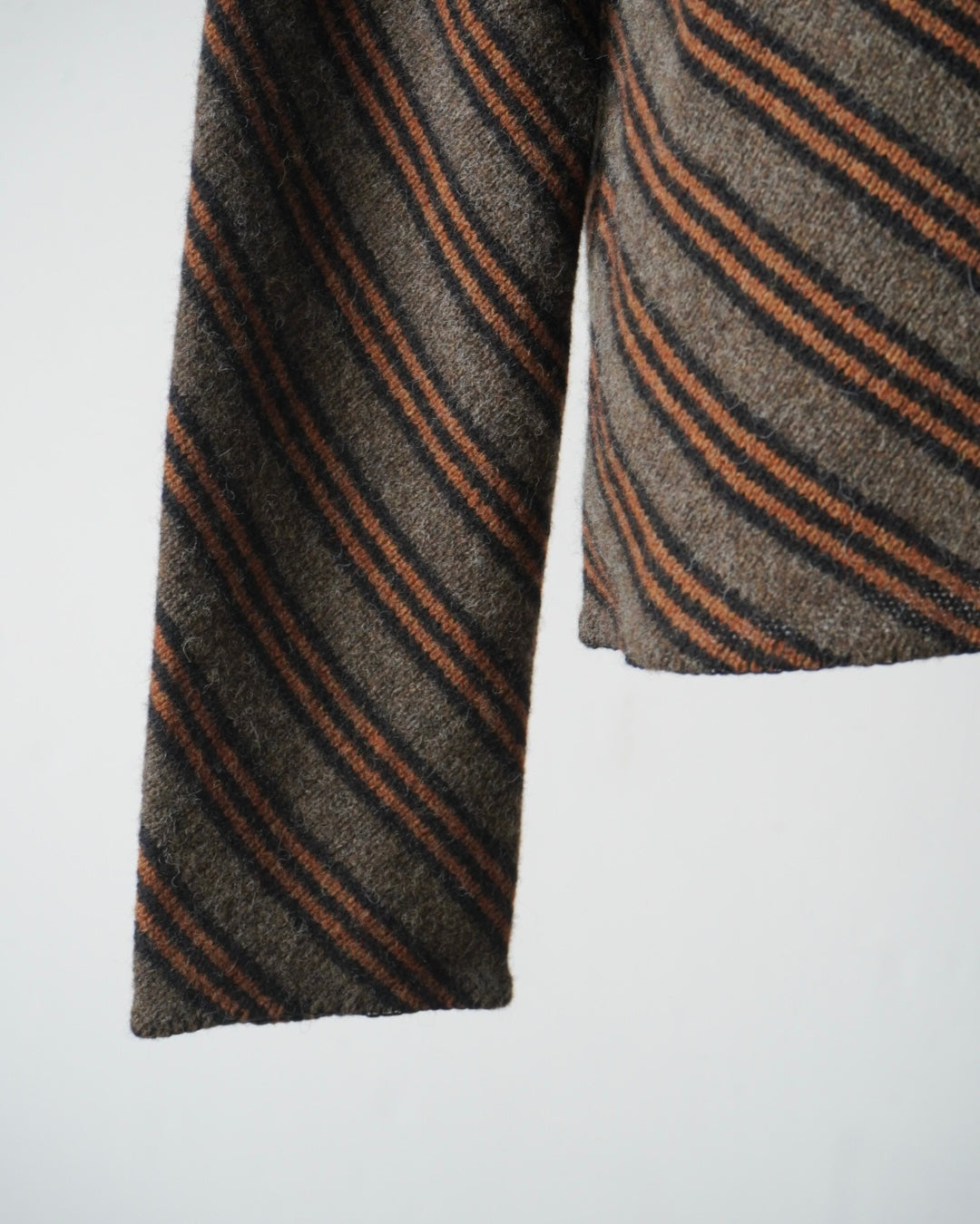 DIGONAL STRIPED SWEATER