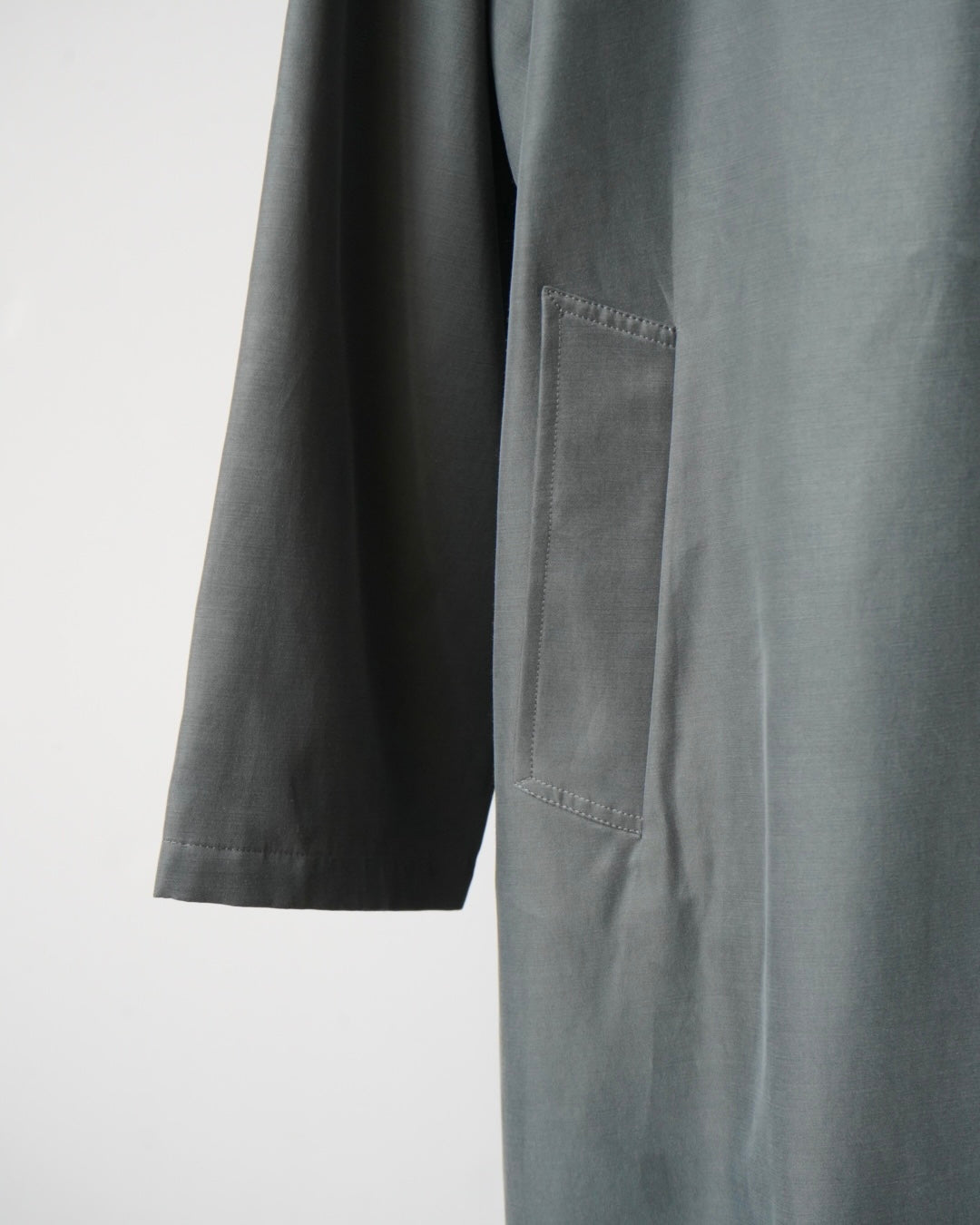 OVERSIZED TRENCH WITH LEATHER PATCH