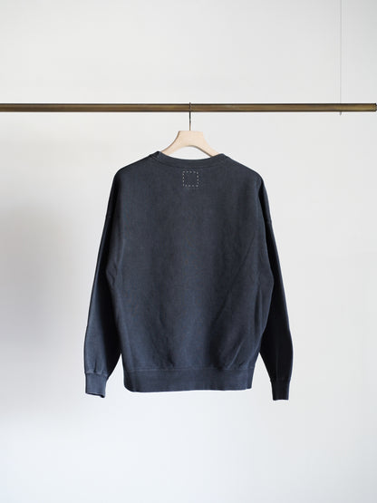 visvimのJUMBO SB SWEAT L/S DMGDのカラーはブラックの背面が写った商品画像です。