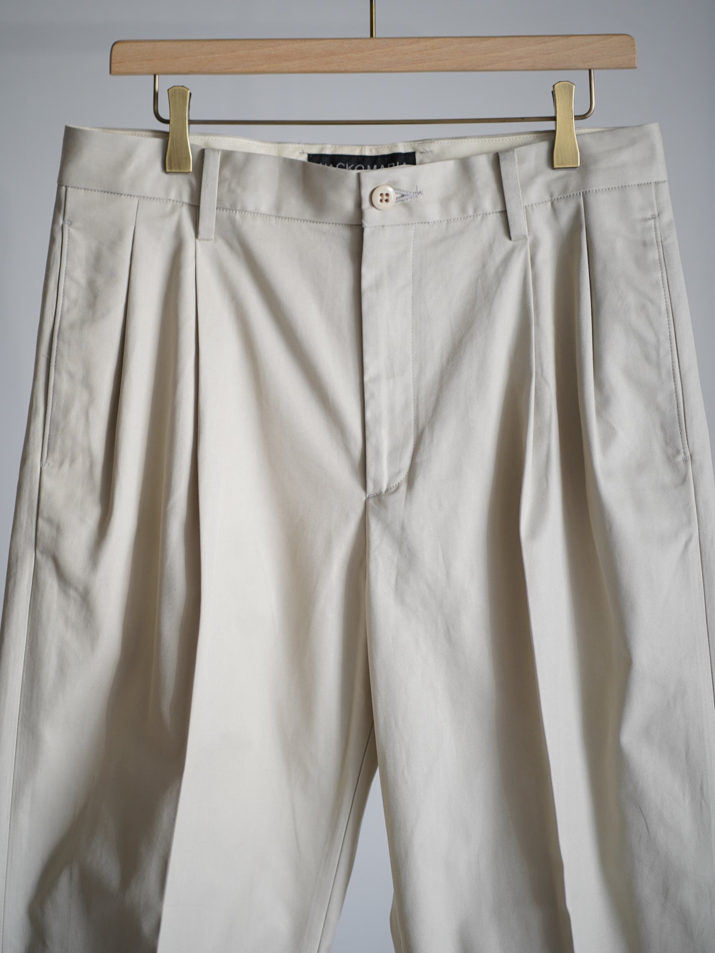 DOUBLE PLEATED CHINO TROUSERS
