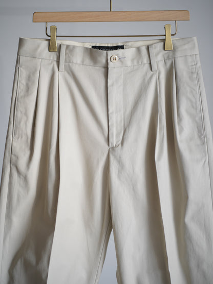 DOUBLE PLEATED CHINO TROUSERS