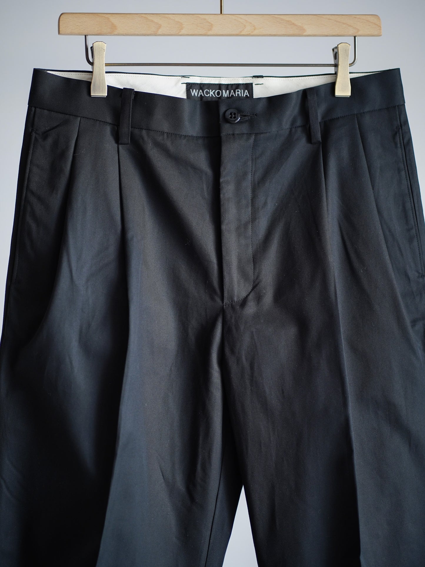 DOUBLE PLEATED CHINO TROUSERS