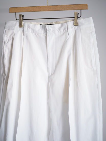 DOUBLE PLEATED CHINO TROUSERS