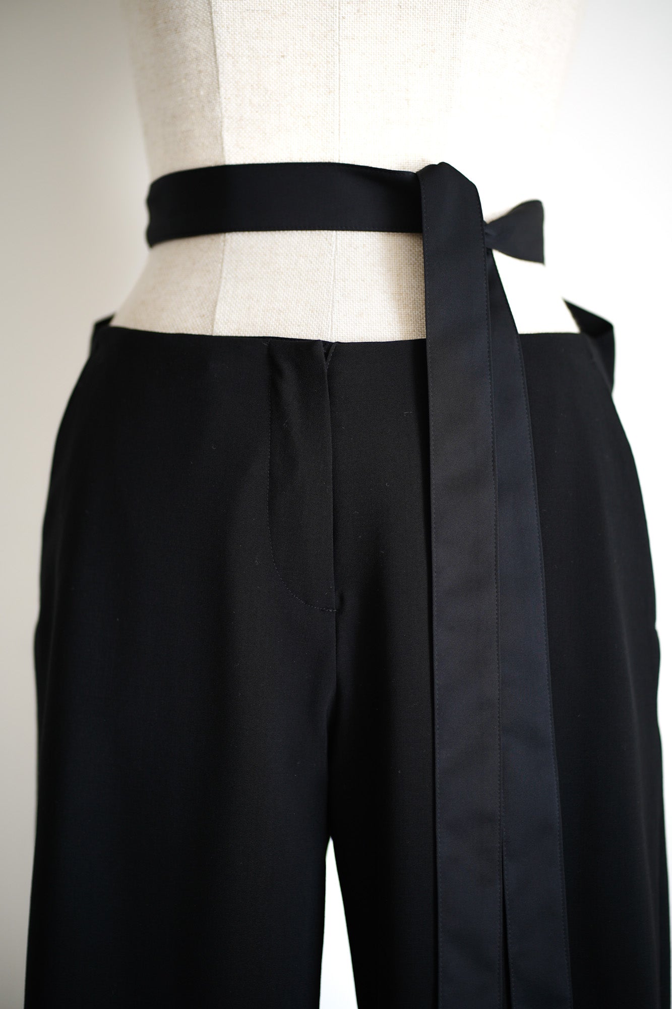 FRINGED BELT TROUSERS